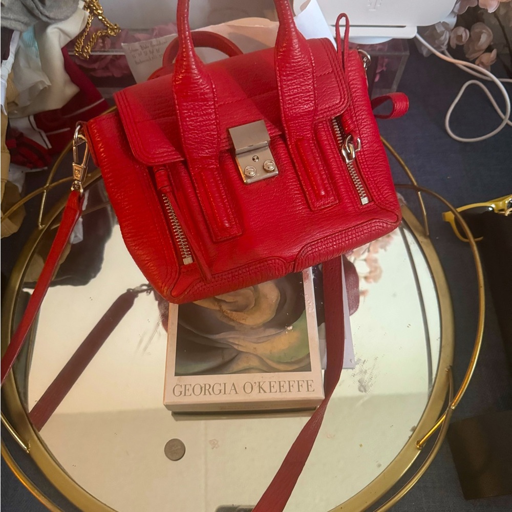 Red Phillip Lim bag, have some wear. Still good condition.